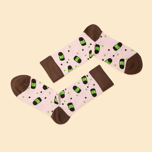 Light pink socks featuring a Swedish punch roll pattern with dark brown cuffs, heels, and toes.