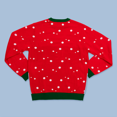 Red gingerbread house Christmas sweater for men with white snowflakes and green cuffs, back view.