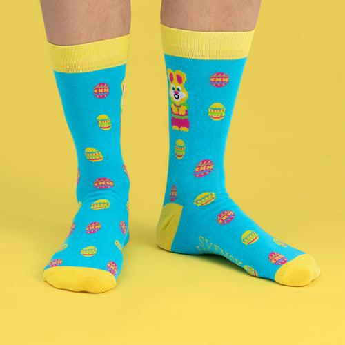 Light blue Easter socks with a bunny and egg pattern and yellow details from Svenskhusman.