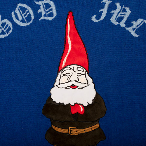 Blå stickad jultröja med hustomte-motiv och vit God Jul-text från Svenskhusman.