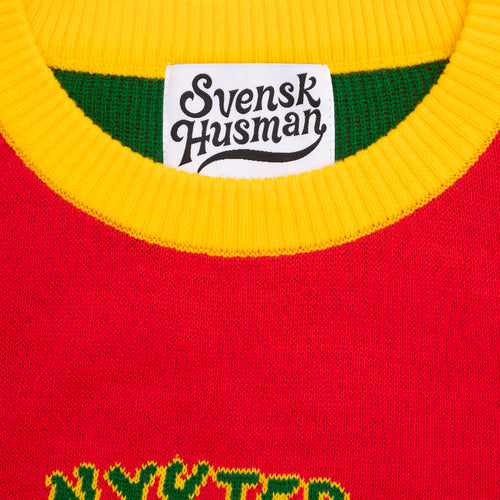Red knit Christmas sweater with a yellow collar, Svenskhusman label, and 