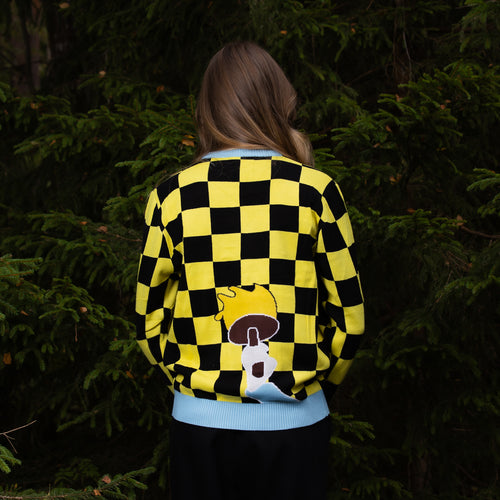 Yellow and black checkered Christmas sweater with Santa