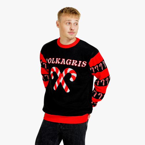 Schwarzer gestrickter Herren-Weihnachtspullover mit Polkagris-Schriftzug und roten Zuckerstangen-Motiven.