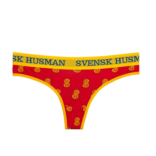 Röda stringtrosor Thong med mönster av lussebullar och gult resårband från Svenskhusman.